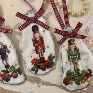 Nutcracker Christmas oyster shell ornaments with tartan ribbon
