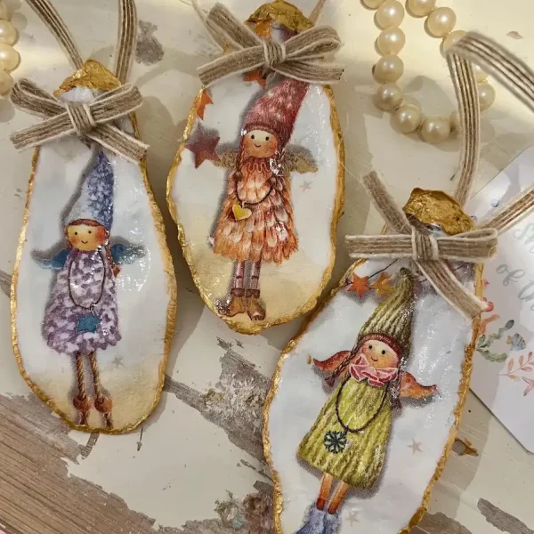 Trio of whimsical fairy oyster shell Christmas ornaments