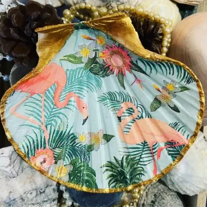 pink flemingo painted on a shell