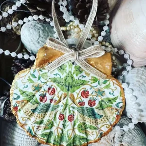 vintage-style scallop shell with birds, strawberries, twine hanger and gold rim