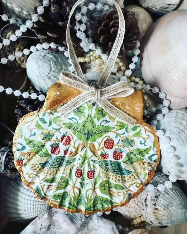 vintage-style scallop shell with birds, strawberries, twine hanger and gold rim